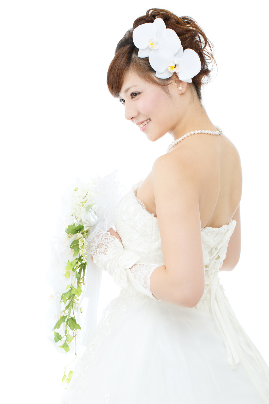 Beautiful asian woman dressed as a bride on white background